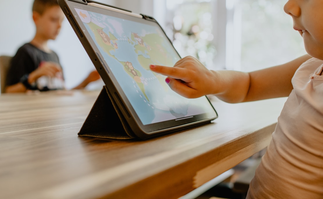 Good school attendance - child with ipad