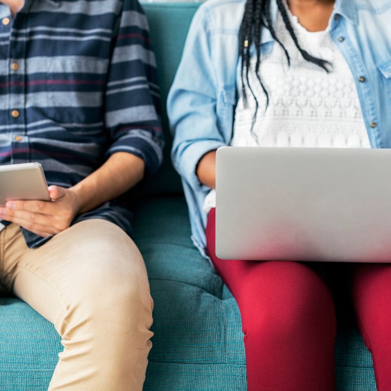 Good school attendance - young people with laptop